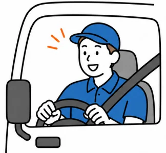 トラックを運転する笑顔のドライバー